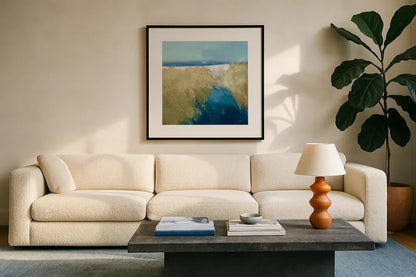 Glimpse of the Shore by Julia Purinton. Displayed in a glass frame with matte in a clean modern living room. Available as an archival giclee rolled canvas, fine art paper, or poster print. SKU 102762a.