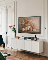 Harvest Bouquet Pomegranate by Julia Purinton. shown as a framed stretched canvas in a living room above a console. Available as a archival giclee rolled canvas, fine art paper, or poster print. SKU 84965i.
