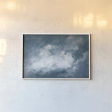 Hedgerow II Clouds by Julia Purinton. shown as a paper print in a white frame. Available as a archival giclee rolled canvas, fine art paper, or poster print. SKU 61005i.