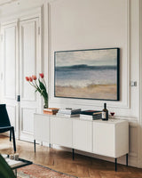 Indigo Isle by Julia Purinton. shown as a framed stretched canvas in a living room above a console. Available as a archival giclee rolled canvas, fine art paper, or poster print. SKU 30288i.