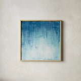 Into the Blue I by Julia Purinton. Shown in a natural wood glass frame for a timeless modern aesthetic. Available as an archival giclee rolled canvas, fine art paper, or poster print. SKU 73766a.