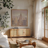 Manhattan in the Mist v2 by Julia Purinton. Shown in a natural wood frame in a cozy modern living room. Available as an archival giclee rolled canvas, fine art paper, or poster print. SKU 45675a.
