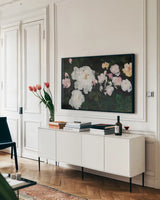 Moms Garden by Julia Purinton. shown as a framed stretched canvas in a living room above a console. Available as a archival giclee rolled canvas, fine art paper, or poster print. SKU 103377i.