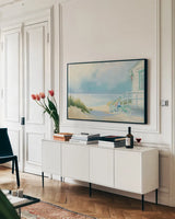 Morning Ride to the Beach by Julia Purinton. shown as a framed stretched canvas in a living room above a console. Available as a archival giclee rolled canvas, fine art paper, or poster print. SKU 46970i.
