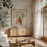 Natural Bouquet II Light by Julia Purinton. Shown in a natural wood frame in a cozy modern living room. Available as an archival giclee rolled canvas, fine art paper, or poster print. SKU 67041a.