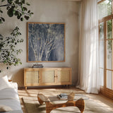 Navy Blue Birch Flipped by Julia Purinton. Shown in a natural wood frame in a cozy modern living room. Available as an archival giclee rolled canvas, fine art paper, or poster print. SKU 56164a.