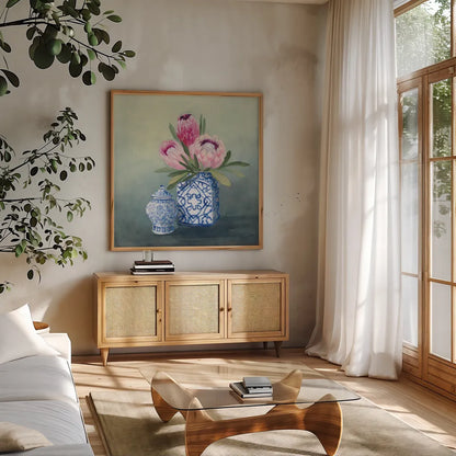 Protea Chinoiserie II by Julia Purinton. Shown in a natural wood frame in a cozy modern living room. Available as an archival giclee rolled canvas, fine art paper, or poster print. SKU 72078a.