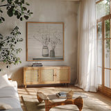 Pussy Willow Still Life Gray Pots Shiplap by Julia Purinton. Shown in a natural wood frame in a cozy modern living room. Available as an archival giclee rolled canvas, fine art paper, or poster print. SKU 36128a.