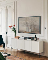 Pussy Willow Still Life with Designs by Julia Purinton. shown as a framed stretched canvas in a living room above a console. Available as a archival giclee rolled canvas, fine art paper, or poster print. SKU 57998i.