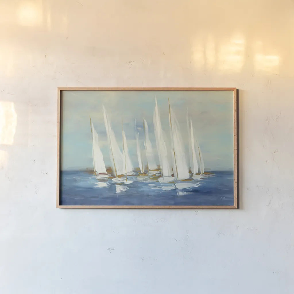 Regatta Sail by Julia Purinton. shown as a paper print in a natural frame. Available as a archival giclee rolled canvas, fine art paper, or poster print. SKU 73872i.