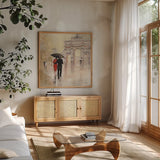 Romantic Paris II by Julia Purinton. Shown in a natural wood frame in a cozy modern living room. Available as an archival giclee rolled canvas, fine art paper, or poster print. SKU 15470a.