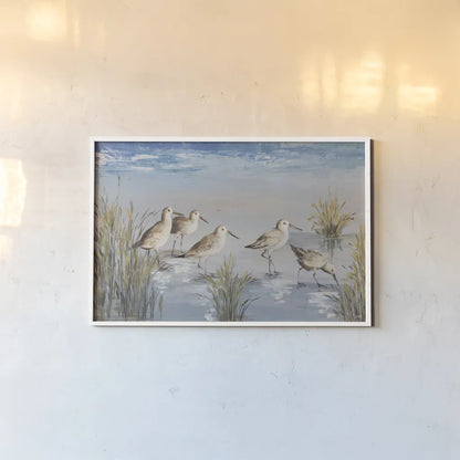 Sandpiper Stroll by Julia Purinton. shown as a paper print in a white frame. Available as a archival giclee rolled canvas, fine art paper, or poster print. SKU 99749i.