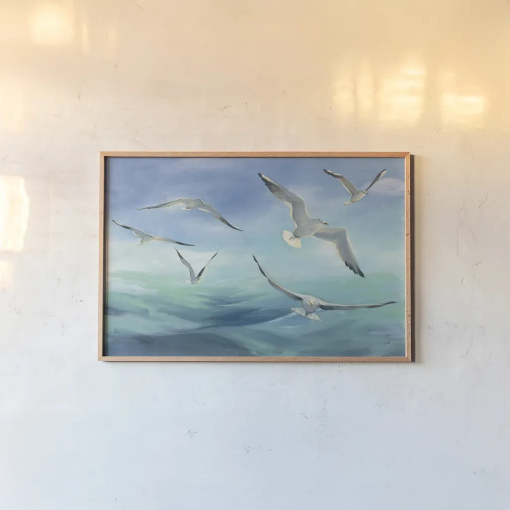 Sea Flight by Julia Purinton. shown as a paper print in a natural frame. Available as a archival giclee rolled canvas, fine art paper, or poster print. SKU 66554i.