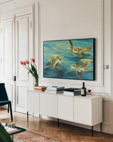 Sea Turtles by Julia Purinton. shown as a framed stretched canvas in a living room above a console. Available as a archival giclee rolled canvas, fine art paper, or poster print. SKU 66555i.