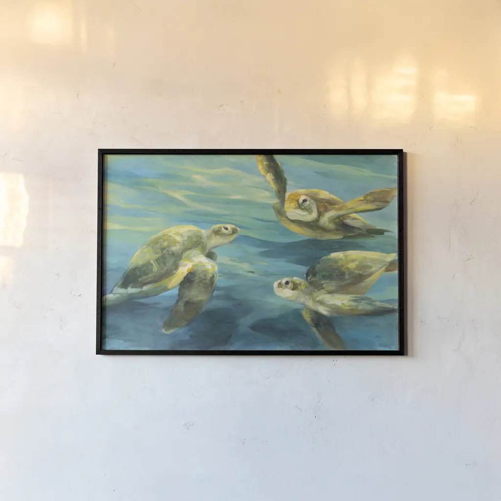 Sea Turtles by Julia Purinton. shown as a paper print in a black flame. Available as a archival giclee rolled canvas, fine art paper, or poster print. SKU 66555i.