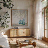 Spring Delight by Julia Purinton. Shown in a natural wood frame in a cozy modern living room. Available as an archival giclee rolled canvas, fine art paper, or poster print. SKU 53865a.