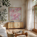 Spring Magnolia I by Julia Purinton. Shown in a natural wood frame in a cozy modern living room. Available as an archival giclee rolled canvas, fine art paper, or poster print. SKU 63245a.