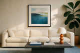 Subtle Sea by Julia Purinton. Displayed in a glass frame with matte in a clean modern living room. Available as an archival giclee rolled canvas, fine art paper, or poster print. SKU 78367a.