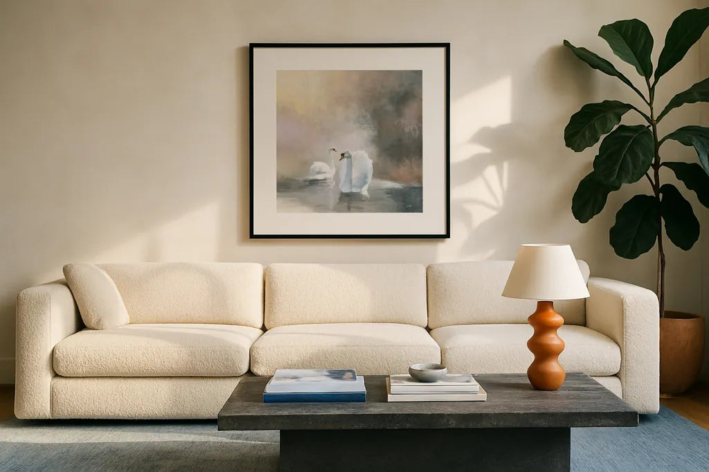 Swans in Mist by Julia Purinton. Displayed in a glass frame with matte in a clean modern living room. Available as an archival giclee rolled canvas, fine art paper, or poster print. SKU 76020a.