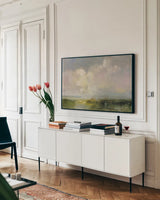 Thoughtful by Julia Purinton. shown as a framed stretched canvas in a living room above a console. Available as a archival giclee rolled canvas, fine art paper, or poster print. SKU 83845i.