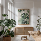 Tropical Study IV Crop by Julia Purinton. shown as a print in a natural wood frame in a dining room. Available as a archival giclee rolled canvas, fine art paper, or poster print. SKU 70137h.