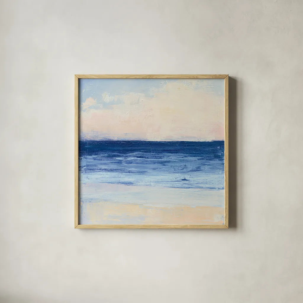 True Blue Ocean I by Julia Purinton. Shown in a natural wood glass frame for a timeless modern aesthetic. Available as an archival giclee rolled canvas, fine art paper, or poster print. SKU 24586a.