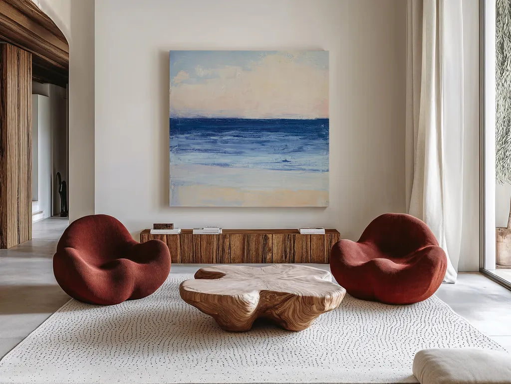 True Blue Ocean I by Julia Purinton. Shown as extra-large giant wall art in a modern living room. Available as an archival giclee rolled canvas, fine art paper, or poster print. SKU 24586a.
