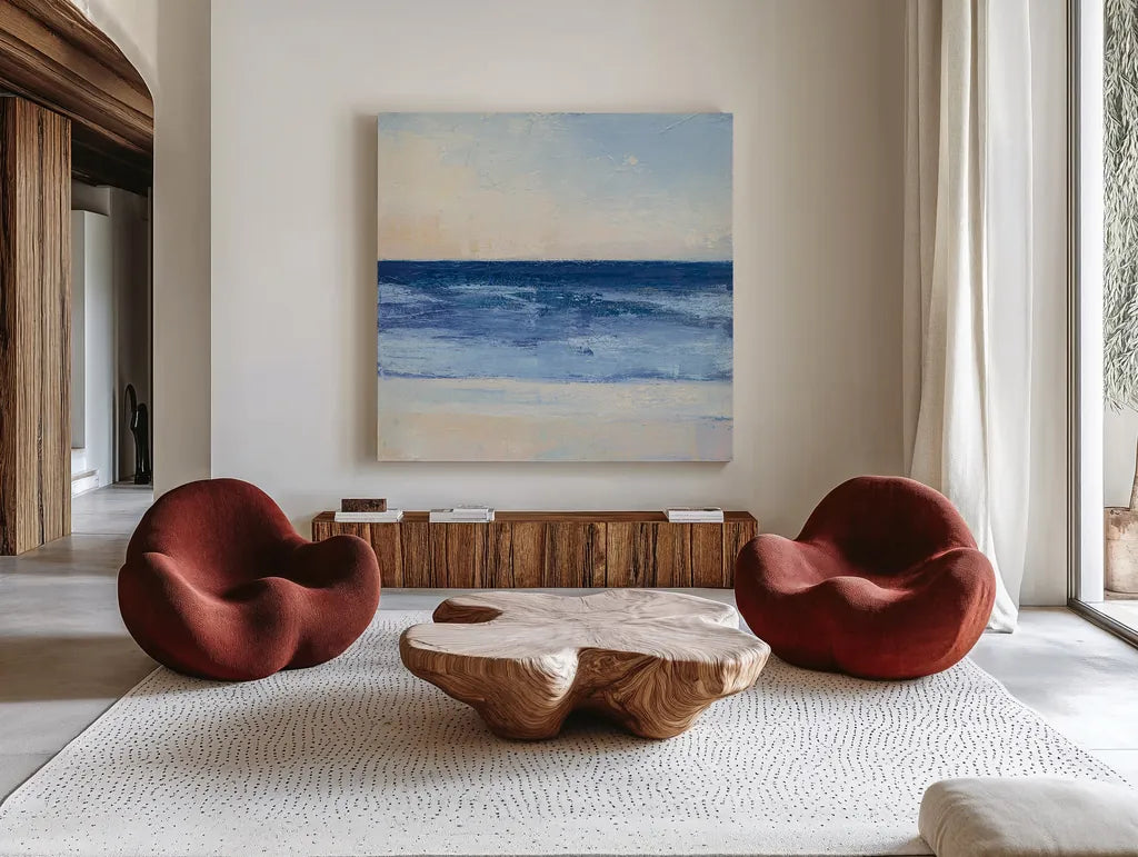 True Blue Ocean II by Julia Purinton. Shown as extra-large giant wall art in a modern living room. Available as an archival giclee rolled canvas, fine art paper, or poster print. SKU 24587a.