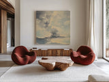 Warm Evening Clouds by Julia Purinton. Shown as extra-large giant wall art in a modern living room. Available as an archival giclee rolled canvas, fine art paper, or poster print. SKU 70267a.