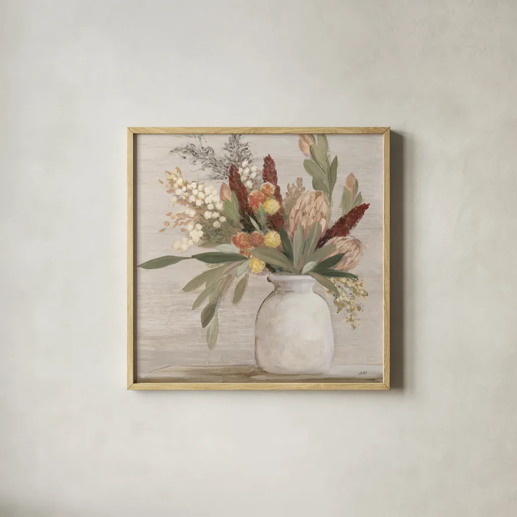Warm Protea Still Life Crop by Julia Purinton. Shown in a natural wood glass frame for a timeless modern aesthetic. Available as an archival giclee rolled canvas, fine art paper, or poster print. SKU 77175a.