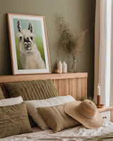 Whos Your Llama I Crop by Julia Purinton. shown as a paper print in a natural frame. Available as a archival giclee rolled canvas, fine art paper, or poster print. SKU 36176h.