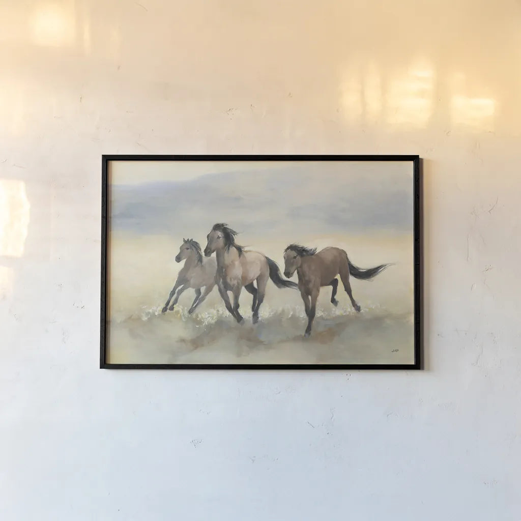 Wild Mustangs by Julia Purinton. shown as a paper print in a black flame. Available as a archival giclee rolled canvas, fine art paper, or poster print. SKU 70759i.