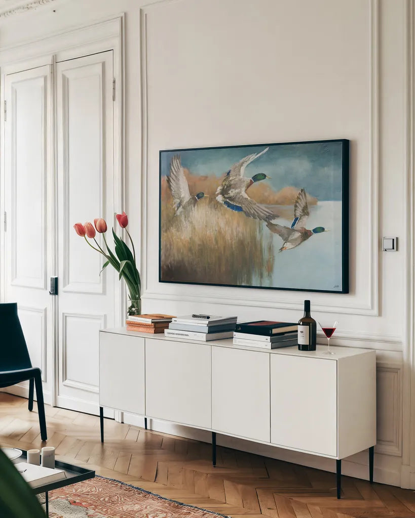 Wild Wings by Julia Purinton. shown as a framed stretched canvas in a living room above a console. Available as a archival giclee rolled canvas, fine art paper, or poster print. SKU 97244i.