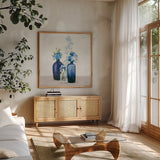 Windowsill Garden II Cobalt by Julia Purinton. Shown in a natural wood frame in a cozy modern living room. Available as an archival giclee rolled canvas, fine art paper, or poster print. SKU 67769a.