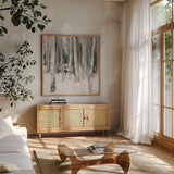 Winter Woods II Neutral by Julia Purinton. Shown in a natural wood frame in a cozy modern living room. Available as an archival giclee rolled canvas, fine art paper, or poster print. SKU 77160a.