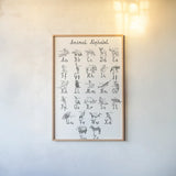 Animal Alphabet by Kasia Kucwaj-Tybur. shown as a paper print in a natural frame. Available as a archival giclee rolled canvas, fine art paper, or poster print. SKU 83201h.