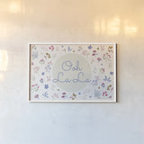 French Garden II by Kasia Kucwaj-Tybur. shown as a paper print in a white frame. Available as a archival giclee rolled canvas, fine art paper, or poster print. SKU 83407i.