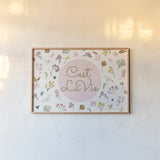 French Garden III by Kasia Kucwaj-Tybur. shown as a paper print in a natural frame. Available as a archival giclee rolled canvas, fine art paper, or poster print. SKU 83408i.
