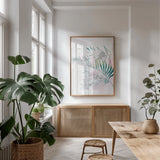 Tropical Floral I by Kasia Kucwaj-Tybur. shown as a print in a natural wood frame in a dining room. Available as a archival giclee rolled canvas, fine art paper, or poster print. SKU 81516h.