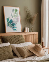 Tropical Floral II by Kasia Kucwaj-Tybur. shown as a paper print in a natural frame. Available as a archival giclee rolled canvas, fine art paper, or poster print. SKU 81517h.