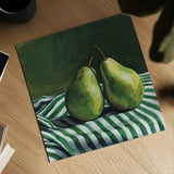 A Pair of Pears On Tablecloth by Kate Jarvik Birch. Shown as a detailed flat fine art print, highlighting archival giclee quality. Available as an archival giclee rolled canvas, fine art paper, or poster print. SKU 101973a.