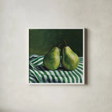 A Pair of Pears On Tablecloth by Kate Jarvik Birch. Shown in a crisp white glass frame for a clean and minimalist style. Available as an archival giclee rolled canvas, fine art paper, or poster print. SKU 101973a.