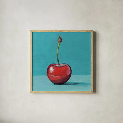 A Single Shiny Cherry by Kate Jarvik Birch. Shown in a natural wood glass frame for a timeless modern aesthetic. Available as an archival giclee rolled canvas, fine art paper, or poster print. SKU 101978a.