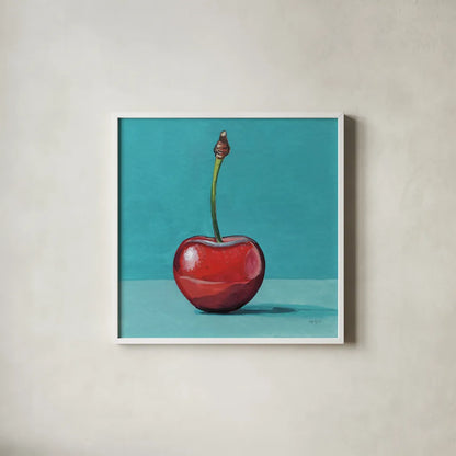 A Single Shiny Cherry by Kate Jarvik Birch. Shown in a crisp white glass frame for a clean and minimalist style. Available as an archival giclee rolled canvas, fine art paper, or poster print. SKU 101978a.