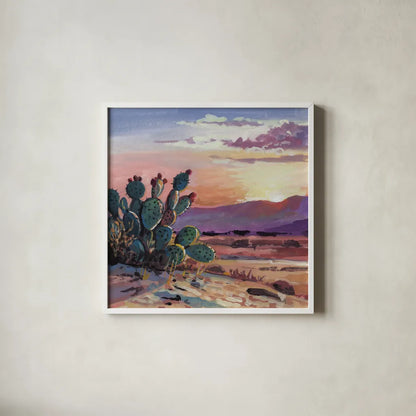 Cacti Sunset by Kate Jarvik Birch. Shown in a crisp white glass frame for a clean and minimalist style. Available as an archival giclee rolled canvas, fine art paper, or poster print. SKU 99773a.