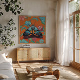 Colorful Moth on Pattern by Kate Jarvik Birch. Shown in a natural wood frame in a cozy modern living room. Available as an archival giclee rolled canvas, fine art paper, or poster print. SKU 100952a.
