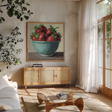 Country Kitchen Strawberries by Kate Jarvik Birch. Shown in a natural wood frame in a cozy modern living room. Available as an archival giclee rolled canvas, fine art paper, or poster print. SKU 100955a.