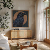 Crow By Golden Moon by Kate Jarvik Birch. Shown in a natural wood frame in a cozy modern living room. Available as an archival giclee rolled canvas, fine art paper, or poster print. SKU 100963a.