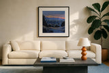 Desert City Lights at Dusk by Kate Jarvik Birch. Displayed in a glass frame with matte in a clean modern living room. Available as an archival giclee rolled canvas, fine art paper, or poster print. SKU 98566a.