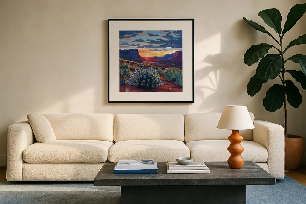Desert Sunset On Blooming Bush by Kate Jarvik Birch. Displayed in a glass frame with matte in a clean modern living room. Available as an archival giclee rolled canvas, fine art paper, or poster print. SKU 98560a.